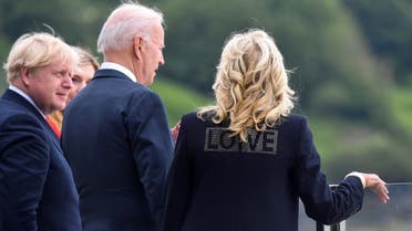 US first lady Jill Biden wearing a jacket with the word “Love” stands next to US President Joe Biden, Britain’s Prime Minister Boris Johnson and his wife Carrie Johnson, during their meeting, at Carbis Bay, Cornwall, Britain, on June 10, 2021. (Reuters)