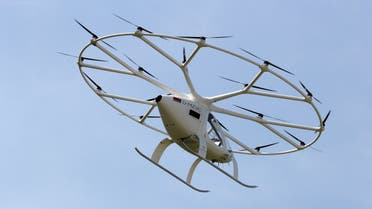 A prototype of an electrical air taxi that takes off and lands vertically (eVTOLs), made by German startup Volocopter, flies during a demonstration round at the Daimler museum in Stuttgart, Germany, September 14, 2019. (Reuters)