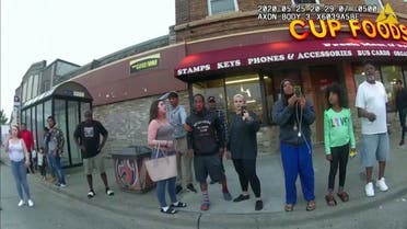 This May 25, 2020, file image from a police body camera shows bystanders including Darnella Frazier, third from right filming, as former Minneapolis police officer Derek Chauvin was recorded pressing his knee on George Floyd's neck for several minutes in Minneapolis. Frazier, the teenager who pulled out her cellphone and recorded the police restraint and death of Floyd has been awarded a special citation by the Pulitzer Prizes. (AP)