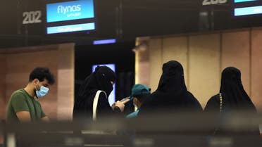 Saudi passengers arrive to King Khaled International airport in the capital Riyadh on May 17, 2021, as Saudi authorities lift travel restrictions for citizens immunized against COVID-19. (AFP)