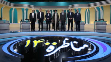 Iran's presidential candidates stand after the election debate at a television studio, in Tehran, Iran June 12, 2021. (Reuters)