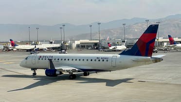 A Delta Airlines plane is seen at the gate at Salt Lake City International Airport (SLC), Utah, on October 5, 2020. (Daniel Slim/AFP)
