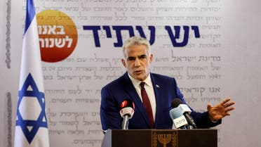 Yesh Atid party leader, Yair Lapid, speaks to the media in the Knesset, Israel's parliament, in Jerusalem, June 7, 2021. REUTERS/ Ronen Zvulun