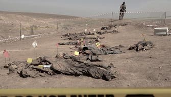 Iraq opens mass grave to identify ISIS Badush prison massacre victims