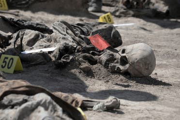 رفات تم استخراجها من المقبرة الجماعية لسجناء بادوش
