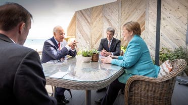 U.S. President Joe Biden, German Chancellor Angela Merkel and advisors Jan Hecker (2ndR) und Jake Sullivan attend a bilateral meeting during a G7 summit in St. Ives, Cornwall, Britain, June 12, 2021. (Reuters)