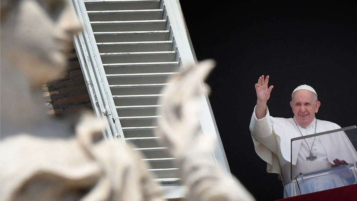 Pope Francis addresses the crowd from the window of the apostolic palace overlooking St.Peter’s square during his Sunday Angelus prayer at the Vatican on June 13, 2021. (Alberto Pizzoli/AFP)