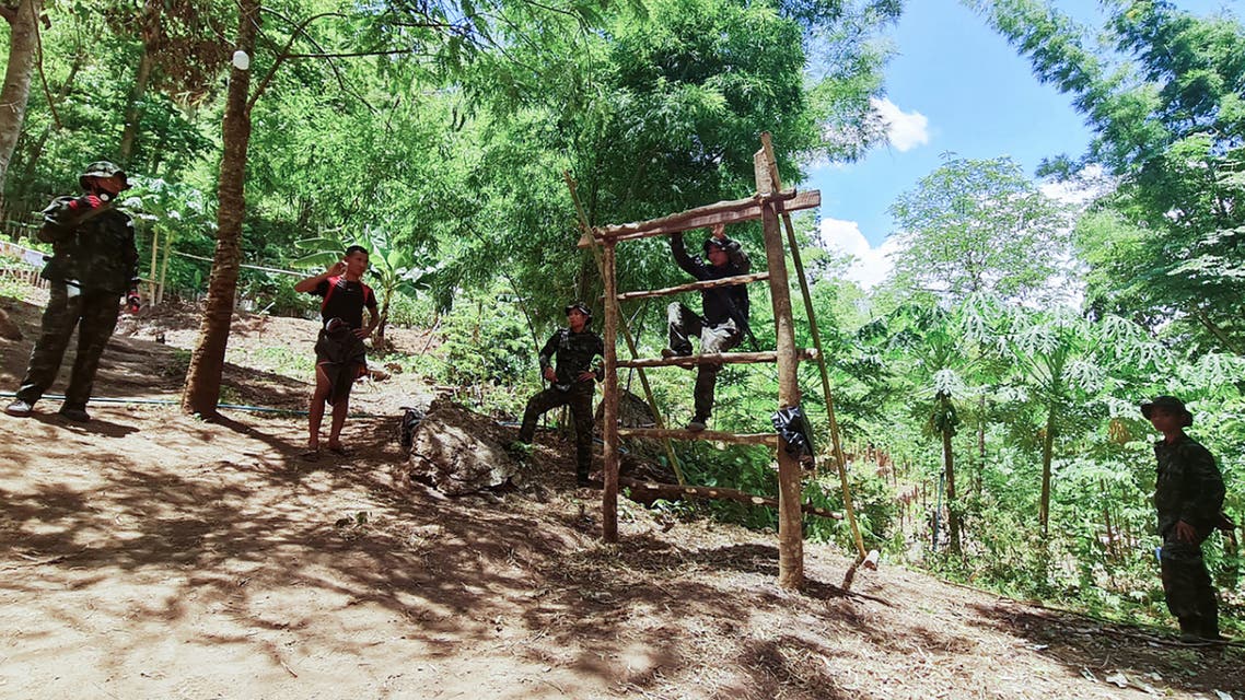 This undated photo taken in May 2021 shows anti-coup activists undergo basic military training at the camp of Karen National Union (KNU), an ethnic rebel group in Karen State after people fled major Myanmar cities due to military crackdown and sought refuge in rebel territories.
