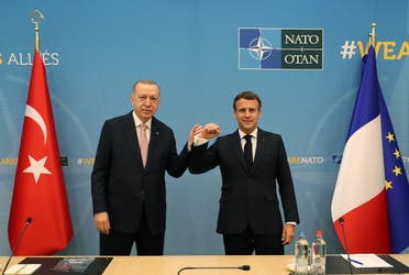 Turkish President Tayyip Erdogan meets with his French counterpart Emmanuel Macron during a bilateral meeting, on the sidelines of the NATO summit, in Brussels, Belgium June 14, 2021. (Reuters)