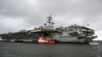 US Navy says carrier group operating in S. China Sea