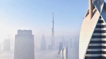 A view of Dubai's Burj Khalifa in the clouds taken from a high-storey building. (Unsplash, Amir Hanna)