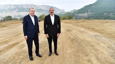 A handout picture taken and released on June 15, 2021 by the Azerbaijan's presidential press service shows Turkish President Tayyip Erdogan (L) meeting with Azerbaijani President Ilham Aliyev (R) in Nagorno-Karabakh region. (Azerbaijani Presidential Press Office/AFP)