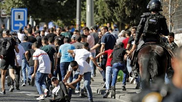  بدء مسيرة الأعلام واشتباكات بين فلسطينيين والقوات الإسرائيلية في القدس