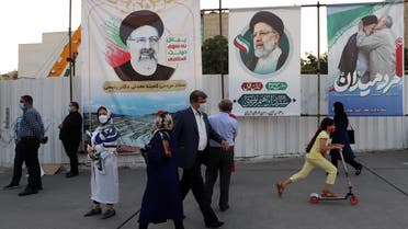 Banners of presidential candidate Ebrahim Raisi are seen during an election rally in Tehran, June 14, 2021. (Reuters)