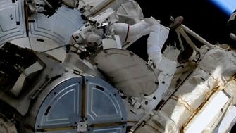 Watch: Astronauts install new space station solar panels in a spacewalk