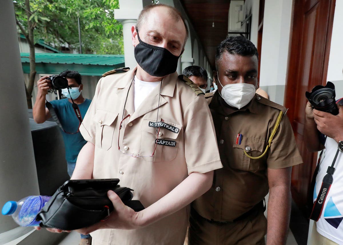 Captain Tyutkalo Vitaly, skipper of the MV X-Press Pearl vessel which caught fire and sank while being towed, leaves the court room after being released on a personal bond while travel ban has been imposed for him in Colombo, Sri Lanka, on June 14, 2021. (Reuters)