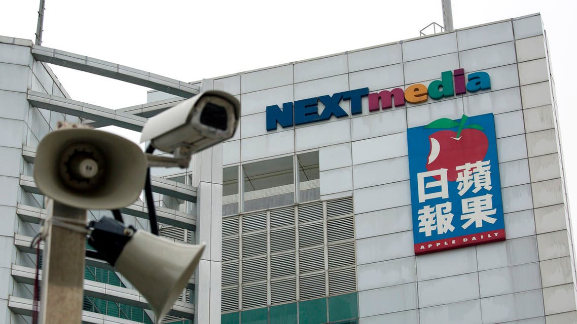 A security camera is seen in front of the headquarters of Apple Daily and Next Media in Hong Kong January 12, 2015. (Reuters)