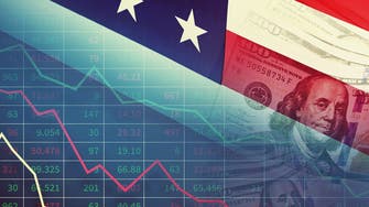 لهجة الفيدرالي المتشددة ترفع الدولار وتهوي بالأسهم