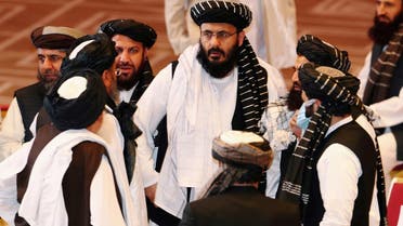 Taliban delegates speak during talks between the Afghan government and Taliban insurgents in Doha, Qatar. (File Photo: Reuters)