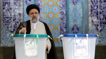 Presidential candidate Ebrahim Raisi casts his vote during presidential elections at a polling station in Tehran, Iran June 18, 2021. (Reuters)