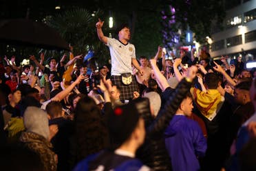 Scotland fans celebrate in London after the match. (Reuters)