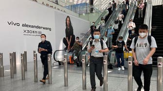 Shenzhen airport tightens COVID-19 measures as China records rise in new cases