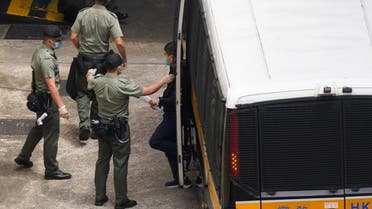 Apple Daily’s editor-in-chief Ryan Law arrives at Lai Chi Kok Reception Centre by a prison van after he remained in custody over the national security law charge, in Hong Kong, China June 19, 2021. (Reuters)