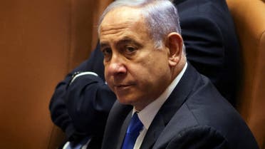 Israeli Prime Minister Benjamin Netanyahu looks on during a special session of the Knesset, Israel's parliament, whereby a confidence vote will be held to approve and swear-in a new coalition government, in Jerusalem June 13, 2021. (Reuters)