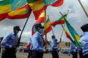 Addis Ababa police officers holding the Ethiopian national flags, take part in a parade to display their new uniforms, and their readiness for the upcoming Ethiopian parliamentary and regional elections, in Addis Ababa, Ethiopia, June 19, 2021. (File photo: Reuters)