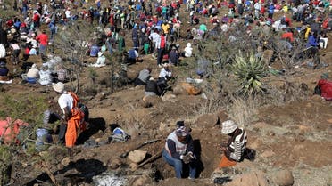Fortune seekers are seen as they flock to the village after pictures and videos were shared on social media showing people celebrating after finding what they believe to be diamonds, in the village of KwaHlathi outside Ladysmith, in KwaZulu-Natal province, South Africa, June 14, 2021. (Reuters/Siphiwe Sibeko)
