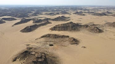 An aerial view taken on June 6, 2021 shows the Well of Barhout known as the Well of Hell in the desert of Yemen's Al-Mahra province. (AFP)