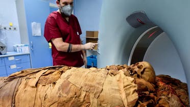 A medical radiology technician prepares a CT scan to do a radiological examination of an Egyptian mummy in order to investigate its history at the Policlinico hospital in Milan, Italy, June 21, 2021. Picture taken June 21, 2021. (Reuters)