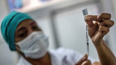 A nurse prepares a dose of the Soberana-02 COVID-19 vaccine, as part of Phase III trials of the experimental Cuban vaccine candidate amid concerns about the spread of the coronavirus disease, in Havana, Cuba, March 24, 2021. (Reuters)