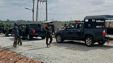 Security personnel stand at a female hostel at the Greenfield University in Kaduna, Nigeria, on April 21, 2021. (Nasu Bori/AFP)