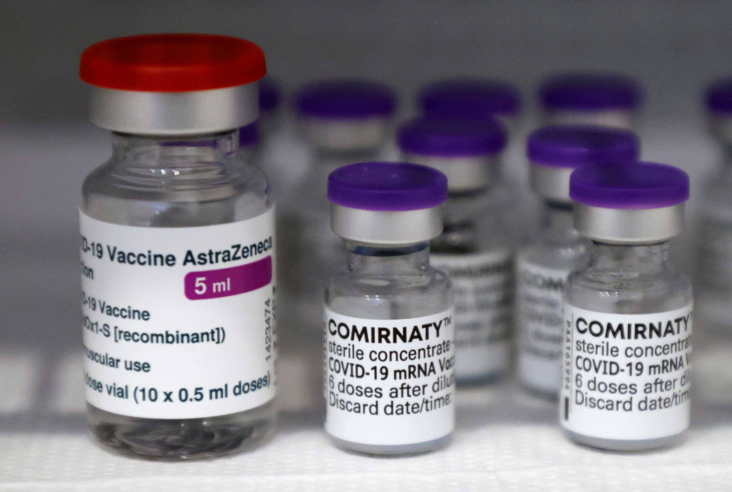 Vials of the AstraZeneca and Pfizer-BioNTech Comirnaty coronavirus disease (COVID-19) vaccines are pictured in a General practitioners practice in Berlin, Germany, April 10, 2021. (Reuters)