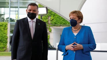 German Chancellor Angela Merkel meets with Libyan Prime Minister Abdulhamid Dbeibeh at the sidelines of the second Libya summit at the Chancellery in Berlin, Germany, June 23, 2021. (Reuters)