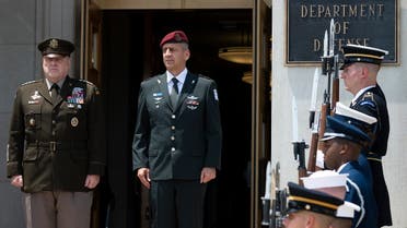 Chairman of the Joint Chiefs of Staff Army General Mark Milley (L) hosts an enhanced honor cordon for the Israeli Chief of Defense LTG Aviv Kohavi at the Pentagon, June 21, 2021. (AFP)