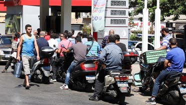 Motorbike riders wait to get fuel at a gas station in Beirut, Lebanon June 17, 2021. (Reuters/Mohamed Azakir)