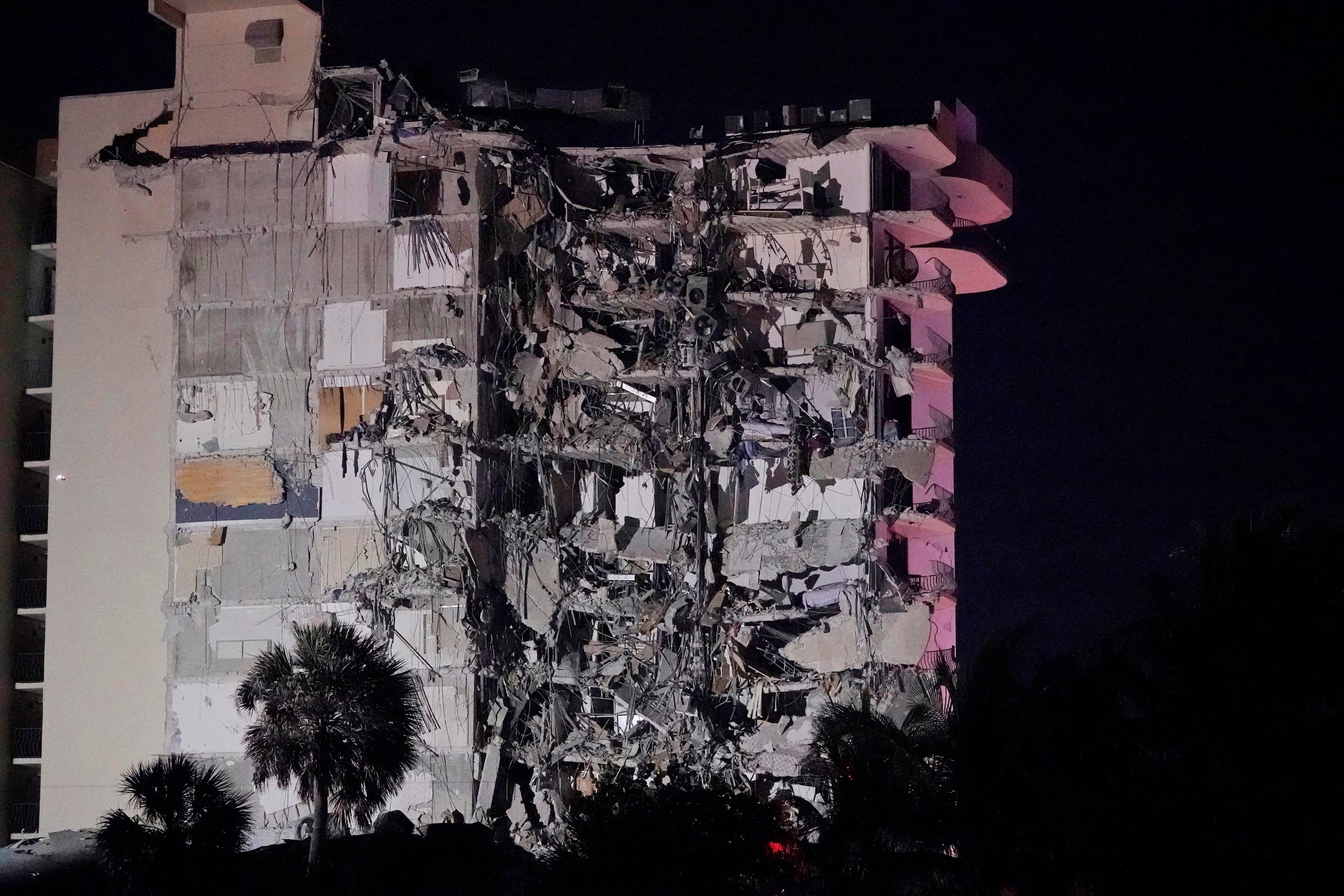 A partially collapsed building is seen early Thursday, June 24, 2021, in the Surfside area of Miami, Florida. (AP)