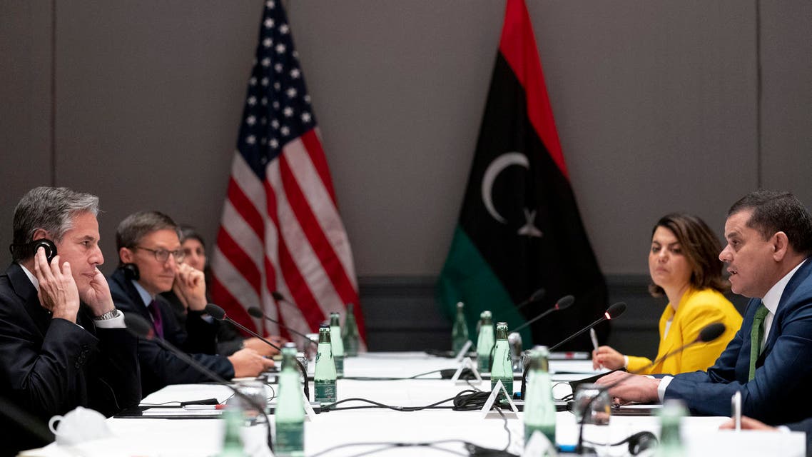 رئيس الحكومة الليبية ووزير الخارجية الأميركي خلال مؤتمر برلين 2 (فرانس برس)