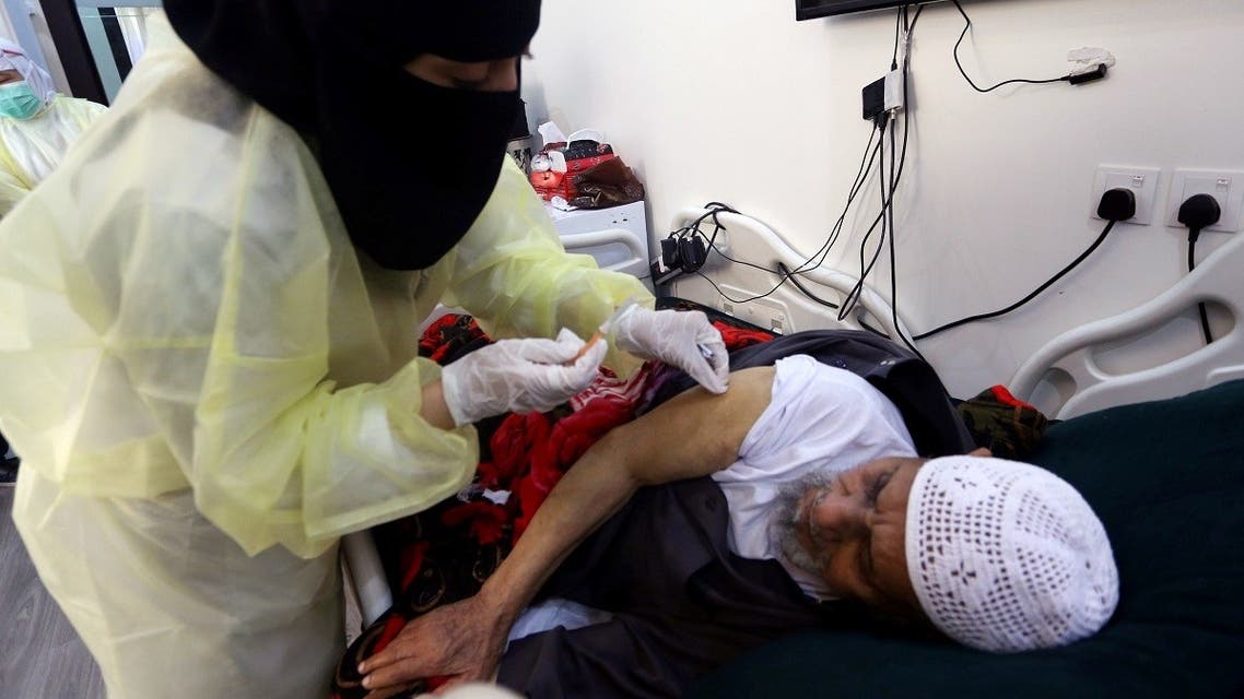 A Saudi man receives a vaccine against the coronavirus disease (COVID-19) during home vaccination campaign for the elderly, at home in Riyadh. (Reuters)