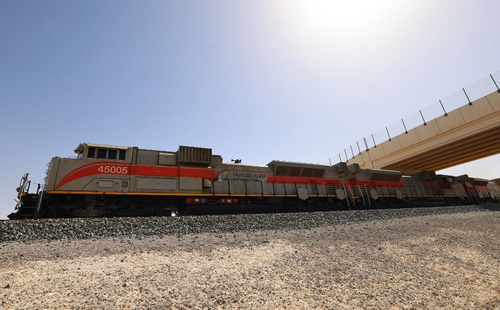 A picture taken on April 1, 2021 shows a train of the Etihad Rail network, in al-Mirfa, in the United Arab Emirates. The United Arab Emirates is well known for its audacious infrastructure and technology projects. (AFP)