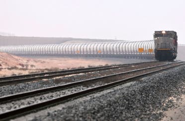 A picture taken on April 1, 2021 shows a train of the Etihad Rail network, in al-Mirfa, in the United Arab Emirates. The United Arab Emirates is well known for its audacious infrastructure and technology projects. (AFP)