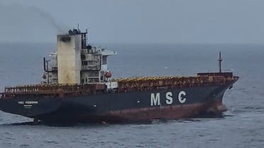 This handout photograph taken on June 25, 2021 and released by the Indian Coast Guard shows smoke billowing from the MSC Messina ship in the Indian Andaman and Nicobar Islands. (Indian Coast Guard/AFP)