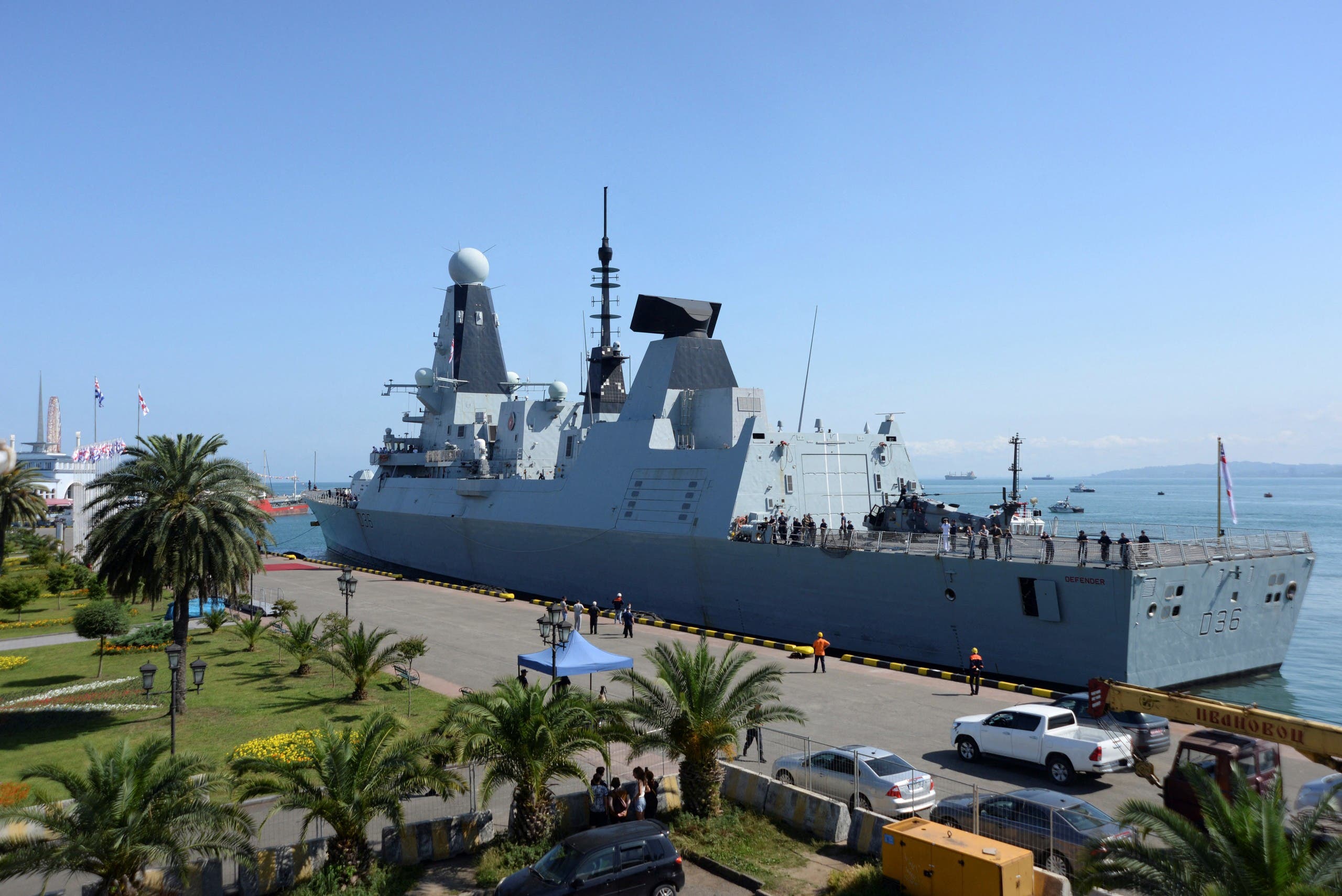 The British Royal Navy destroyer HMS Defender arrives in the Black Sea port of Batumi on June 26, 2021. HMS Defender, makes a port call in Batumi for joint exercises with the NATO-aspirant country’s coast guard, according to the Royal Navy, days after Russia claimed it had fired warning shots at the warship in the coastal waters of Crimea. (AFP)