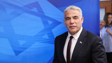Israeli alternate Prime Minister and Foreign Minister Yair Lapid arrives to attend the first weekly cabinet meeting of the new government in Jerusalem June 20, 2021. (Reuters)