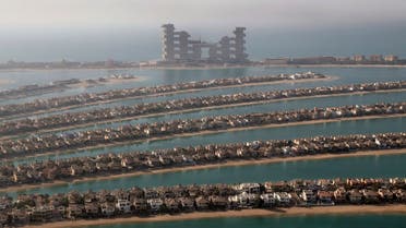  Villas on the fronds of the Jumeirah Palm Island are seen from the observation deck of The View at The Palm Jumeirah, in Dubai, United Arab Emirates, Tuesday, April 6, 2021. (AP)