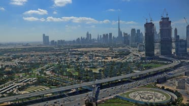 This picture taken on on February 1, 2021 shows a view of the downtown Dubai skyline, with Burj Khalifa, as seen from the Dubai Frame vantage point. (AFP)