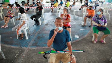  People from Klong Toey community wait to get a coronavirus disease (COVID-19) test, in Bangkok, Thailand, May 4, 2021. (File Photo: Reuters)