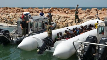 Migrants arrive at the El-Kitif port in the Tunisian town of Ben Guerdane, some 40 kilometres west of the Libyan border, following their rescue by Tunisia's coastguard and navy after their vessel overturned off Libya, on August 23, 2015. (File photo: AFP)